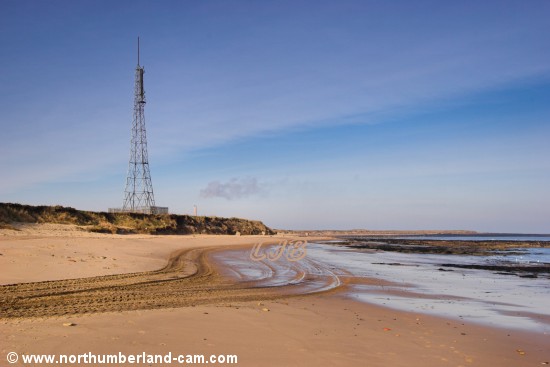 View along the beach beside the moor to Beacon Point.