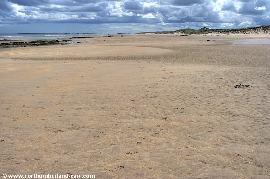 Vew south along the vast beach at Cheswick Sands.