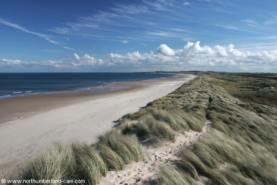 View south along the beach and dunes at Druridge Bay.